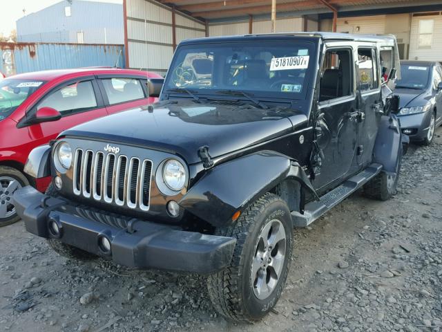 1C4BJWEG1GL264612 - 2016 JEEP WRANGLER U BLACK photo 2