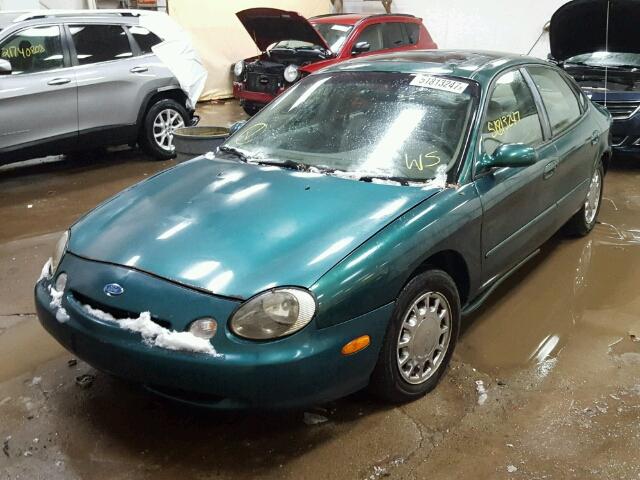 1FAFP53S6XG172637 - 1999 FORD TAURUS SE GREEN photo 2