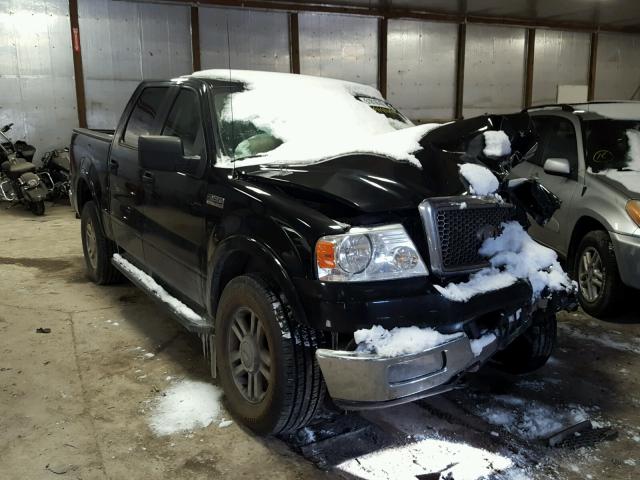 1FTPW14575KC59377 - 2005 FORD F150 SUPER BLACK photo 1