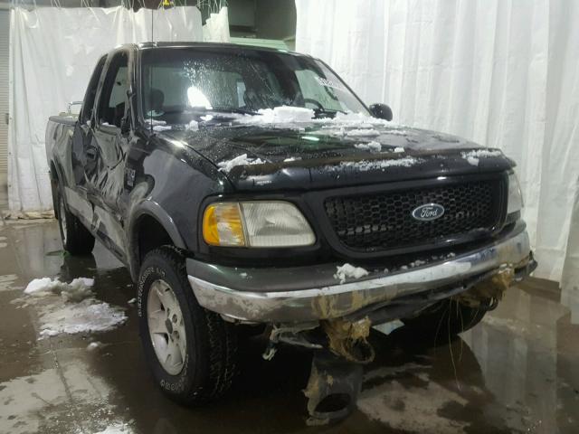 1FTRX18L62NA96908 - 2002 FORD F150 BLACK photo 1