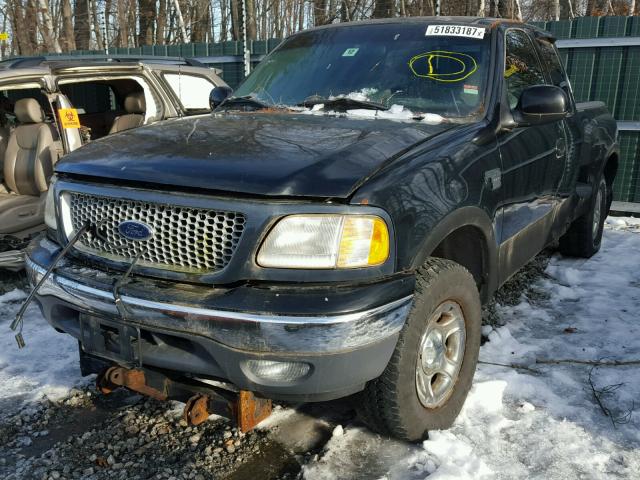 2FTRX08L6XCA90873 - 1999 FORD F150 BLACK photo 2