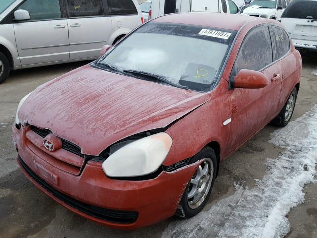 KMHCM36C57U036396 - 2007 HYUNDAI ACCENT GS ORANGE photo 2