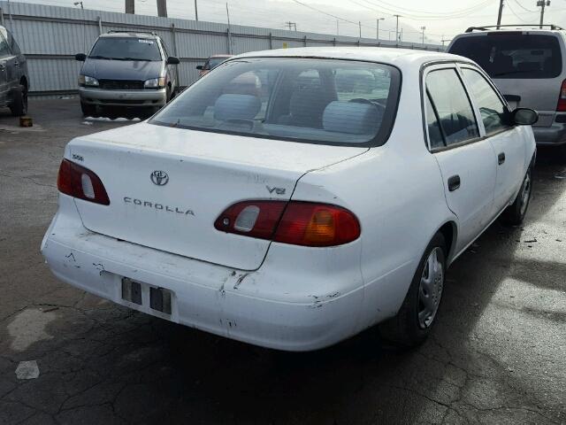 1NXBR12E3WZ082493 - 1998 TOYOTA COROLLA VE WHITE photo 4