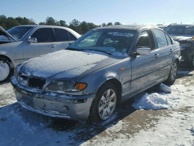 WBAEV33404KR33864 - 2004 BMW 325 I GRAY photo 1