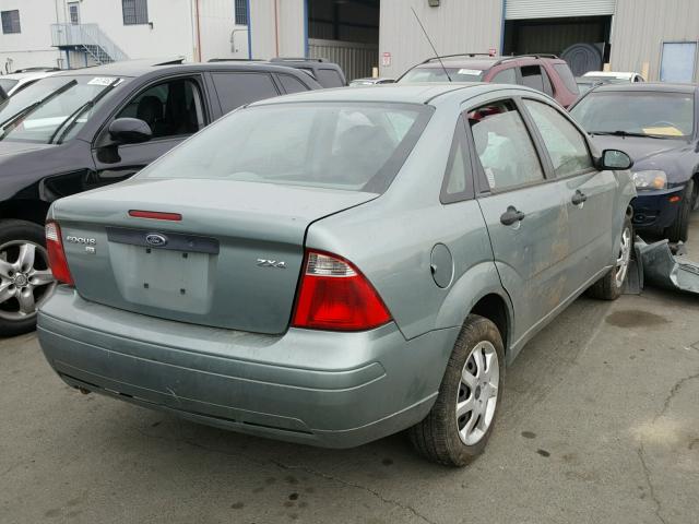 1FAFP34N75W272925 - 2005 FORD FOCUS ZX4 GREEN photo 4