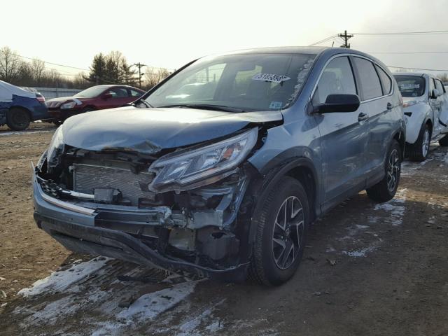 2HKRM4H4XGH665057 - 2016 HONDA CR-V SE BLUE photo 2