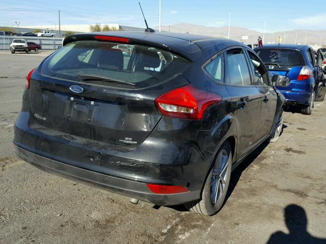 1FADP3K29FL281399 - 2015 FORD FOCUS SE BLACK photo 4