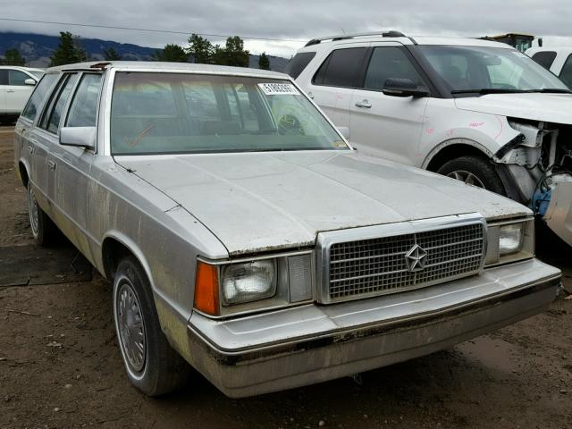 1P3BP49C4EF135012 - 1984 PLYMOUTH RELIANT CU SILVER photo 1