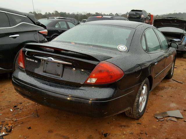 1FAFP53263G271677 - 2003 FORD TAURUS SE BLACK photo 4