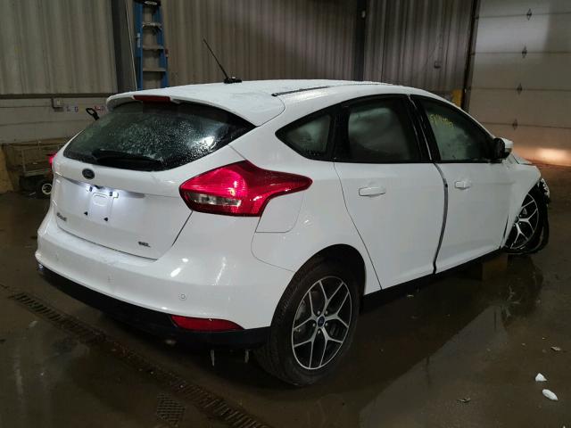 1FADP3M25HL266527 - 2017 FORD FOCUS SEL WHITE photo 4