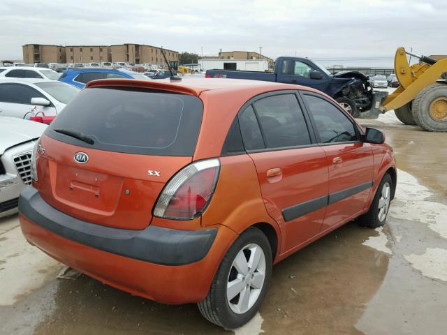 KNADE243296483632 - 2009 KIA RIO 5 SX ORANGE photo 4