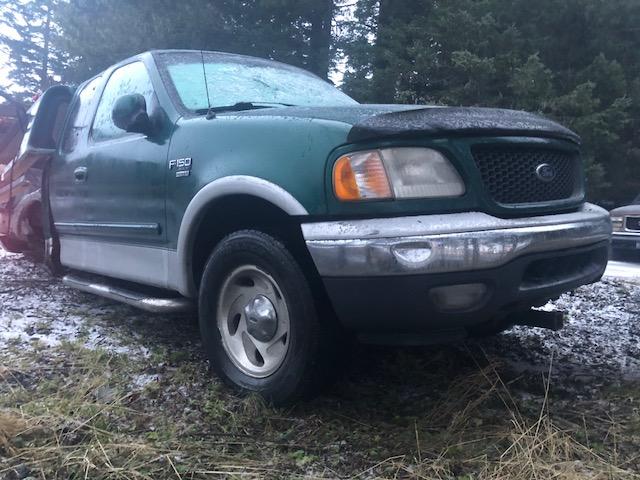 1FTRX18L7YNB70507 - 2000 FORD F150 GREEN photo 1