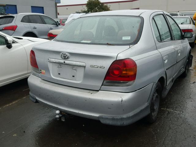 JTDBT123435043132 - 2003 TOYOTA ECHO GRAY photo 4