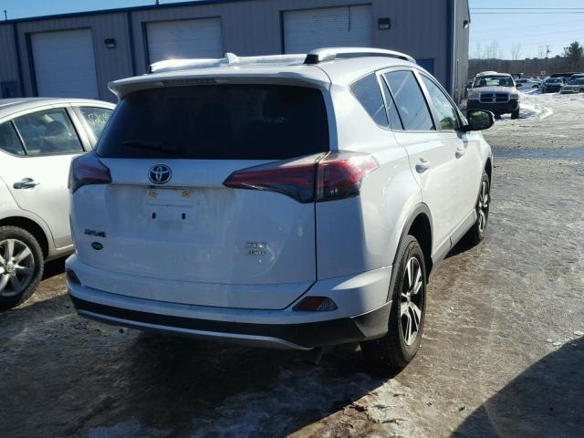 JTMRFREV7GJ082845 - 2016 TOYOTA RAV4 XLE WHITE photo 4