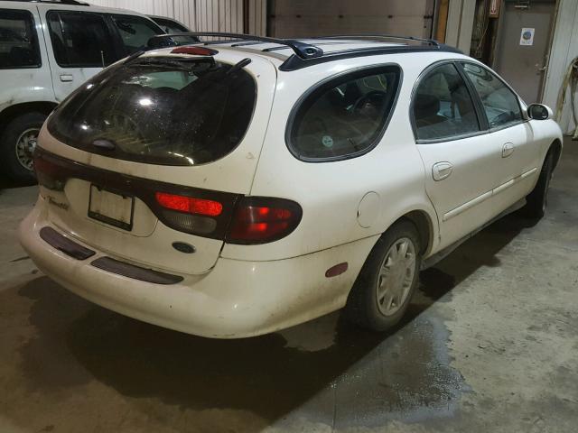 1FAFP57UXWG176586 - 1998 FORD TAURUS SE WHITE photo 4