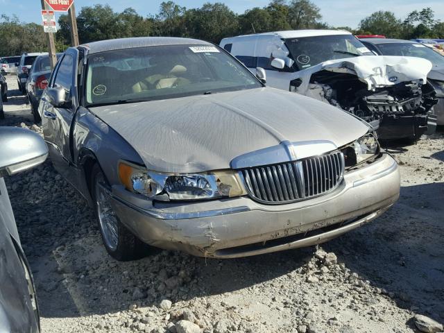 1LNHM81W7XY660763 - 1999 LINCOLN TOWN CAR E GRAY photo 1