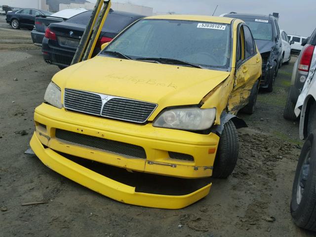 JA3AJ86E02U005681 - 2002 MITSUBISHI LANCER OZ YELLOW photo 2