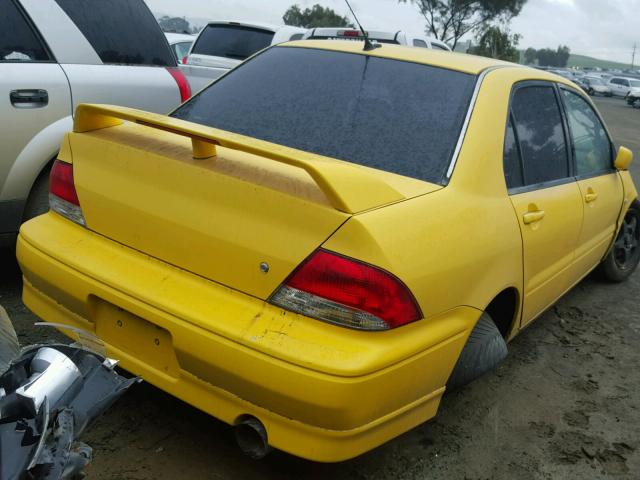 JA3AJ86E02U005681 - 2002 MITSUBISHI LANCER OZ YELLOW photo 4