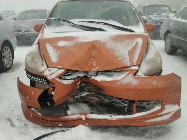 JHMGD38678S062118 - 2008 HONDA FIT SPORT ORANGE photo 9