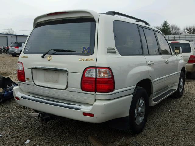 JT6HT00WXX0074056 - 1999 LEXUS LX 470 WHITE photo 4