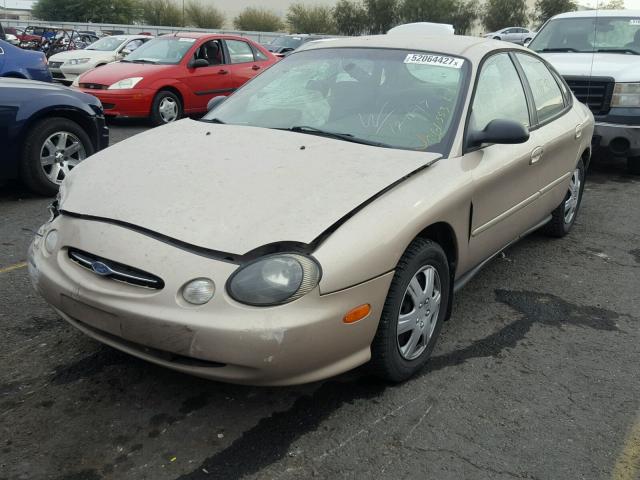 1FAFP52UXXG300901 - 1999 FORD TAURUS LX TAN photo 2