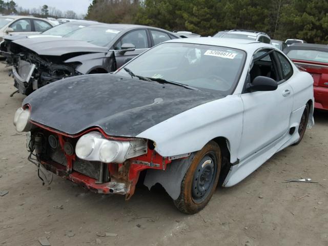 KMHJG25F11U239295 - 2001 HYUNDAI TIBURON GRAY photo 2