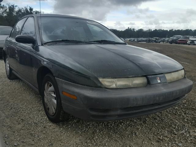 1G8ZH5284XZ375244 - 1999 SATURN SL1 GREEN photo 1