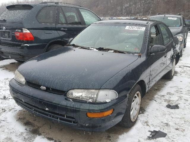 1Y1SK5265VZ448699 - 1997 GEO PRIZM BASE GREEN photo 2