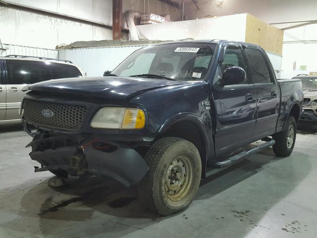 1FTRW08L71KB35762 - 2001 FORD F150 SUPER BLUE photo 2