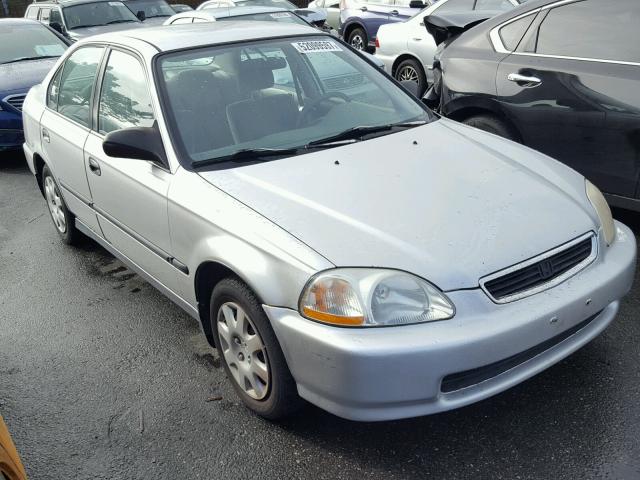 1HGEJ6670WL008697 - 1998 HONDA CIVIC LX SILVER photo 1