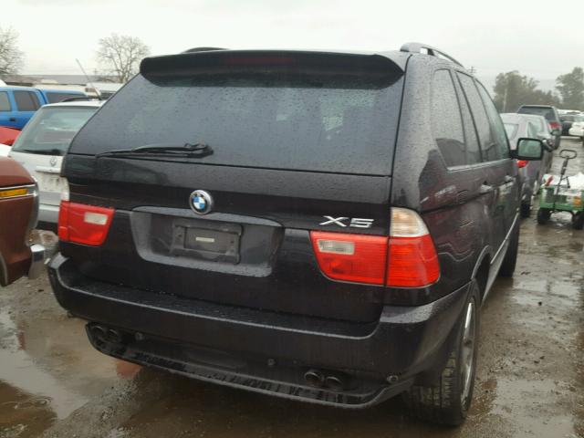 5UXFB33582LH35261 - 2002 BMW X5 4.4I BLACK photo 4