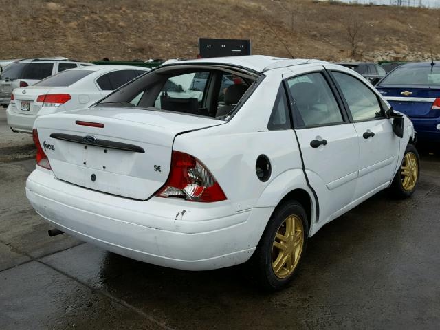 1FAFP34PX2W130484 - 2002 FORD FOCUS SE WHITE photo 4