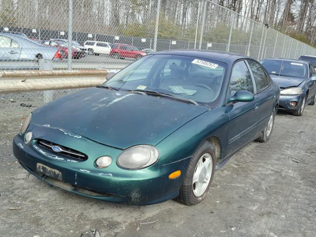 1FAFP53U9XG194763 - 1999 FORD TAURUS SE GREEN photo 2