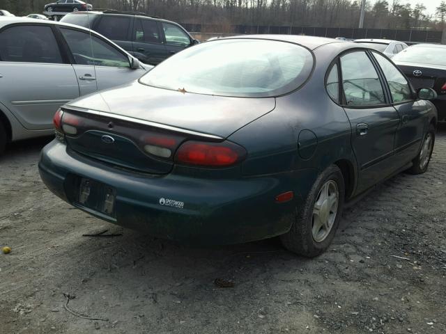 1FAFP53U9XG194763 - 1999 FORD TAURUS SE GREEN photo 4