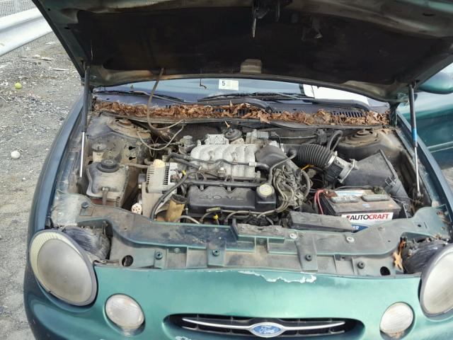 1FAFP53U9XG194763 - 1999 FORD TAURUS SE GREEN photo 7