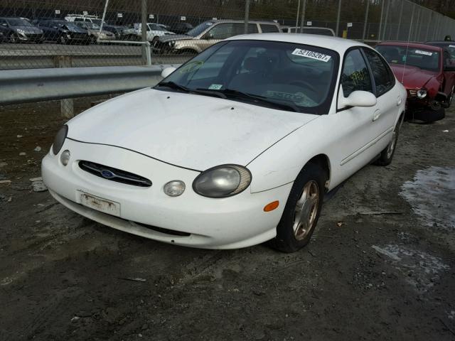 1FAFP53U3XG323404 - 1999 FORD TAURUS SE WHITE photo 2