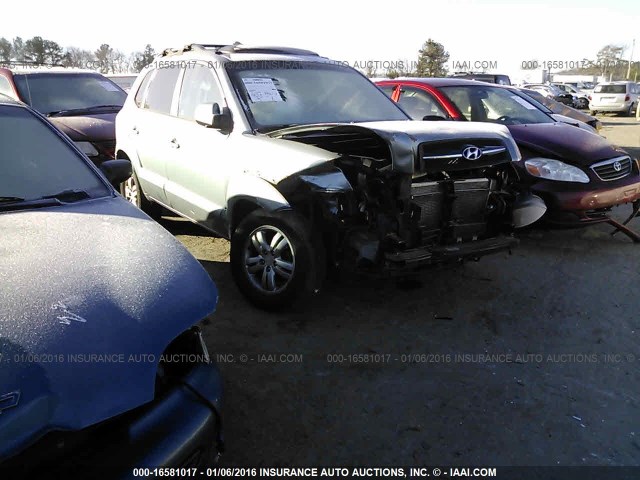 KM8JN72D06U288615 - 2006 HYUNDAI TUCSON GLS/LIMITED BLUE photo 1