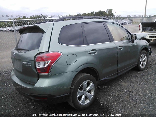 JF2SJAHC6EH455259 - 2014 SUBARU FORESTER 2.5I LIMITED GREEN photo 4