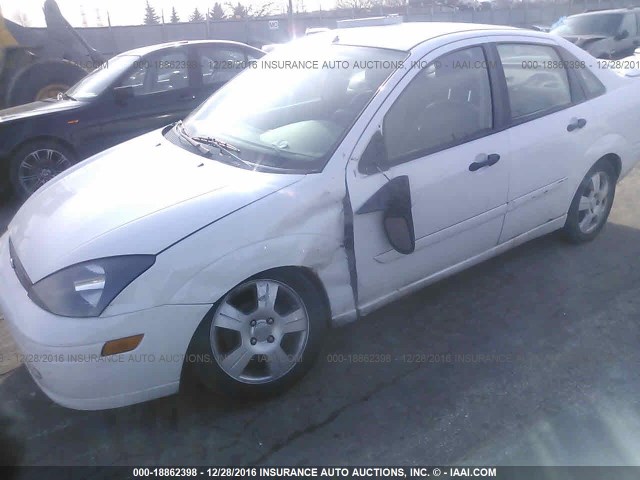 1FAFP38343W332715 - 2003 FORD FOCUS ZTS WHITE photo 6