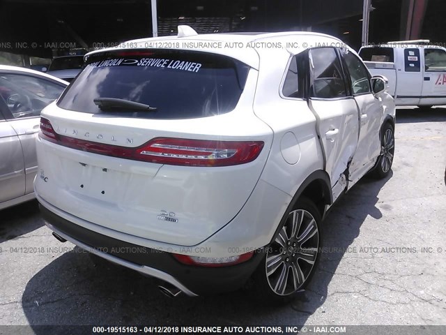 5LMCJ4C97GUJ14942 - 2016 LINCOLN MKC BLACK LABEL TURQUOISE photo 4