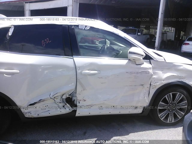 5LMCJ4C97GUJ14942 - 2016 LINCOLN MKC BLACK LABEL TURQUOISE photo 6