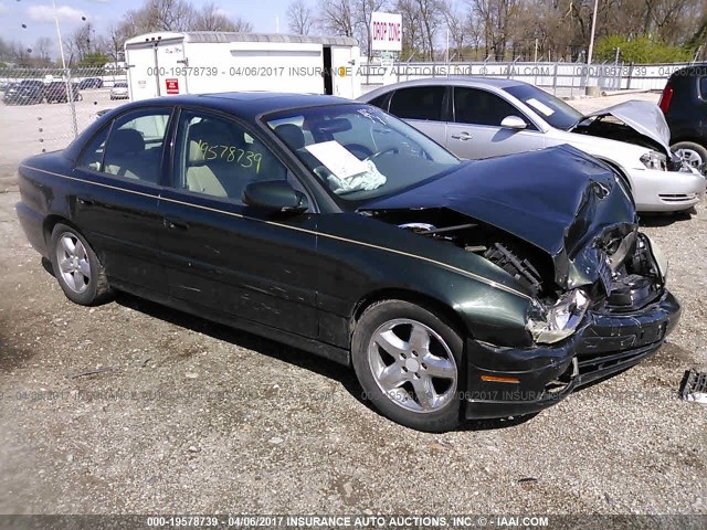 W06VR54R3YR082929 - 2000 CADILLAC CATERA GREEN photo 1