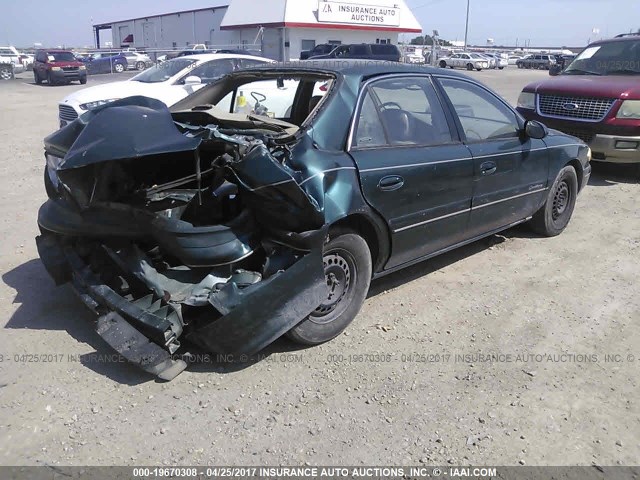 2G4WY52MXW1505052 - 1998 BUICK CENTURY LIMITED GREEN photo 4