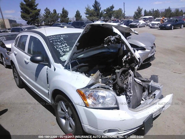 1B3CB3HA7BD254307 - 2011 DODGE CALIBER MAINSTREET WHITE photo 1