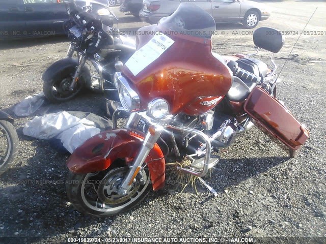 1HD1KB410BB648974 - 2011 HARLEY-DAVIDSON FLHX ORANGE photo 2