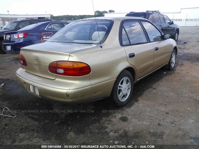 1Y1SK5281YZ400770 - 2000 CHEVROLET GEO PRIZM LSI GOLD photo 4