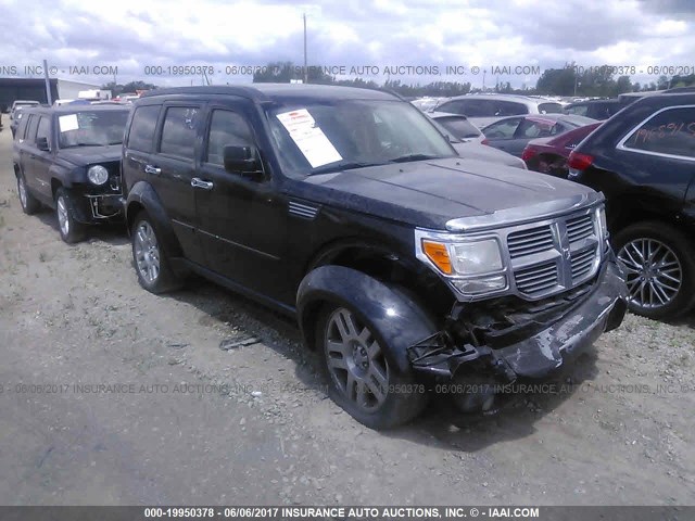 1D8GU58K57W723308 - 2007 DODGE NITRO SLT BLACK photo 1