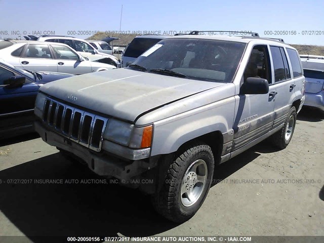 1J4GZ58S6VC597937 - 1997 JEEP GRAND CHEROKEE LAREDO/TSI SILVER photo 2