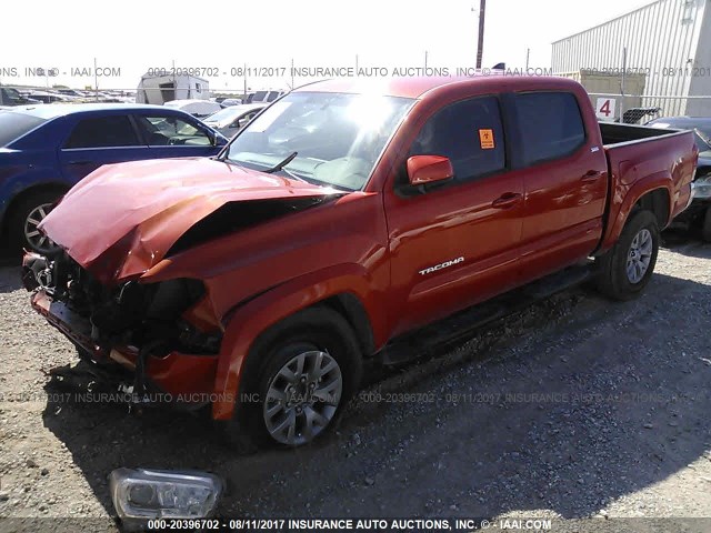 3TMAZ5CN7GM023166 - 2016 TOYOTA TACOMA DBL CAB/SR5/TRD SPORT/OR ORANGE photo 2