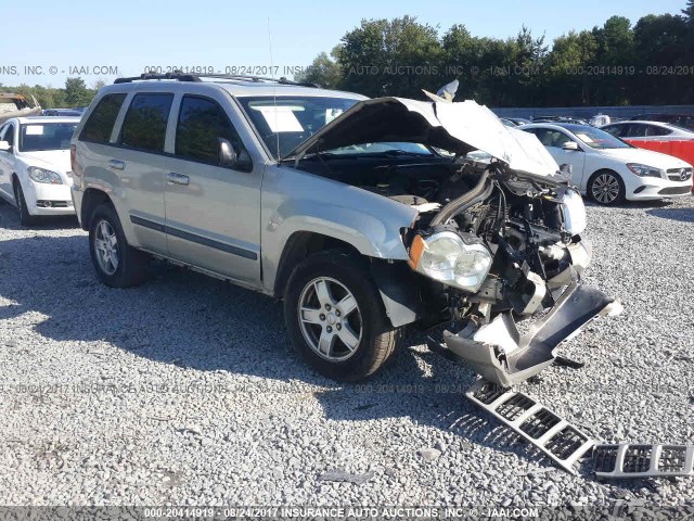 1J8GR48K67C677654 - 2007 JEEP GRAND CHEROKEE LAREDO/COLUMBIA/FREEDOM GRAY photo 1